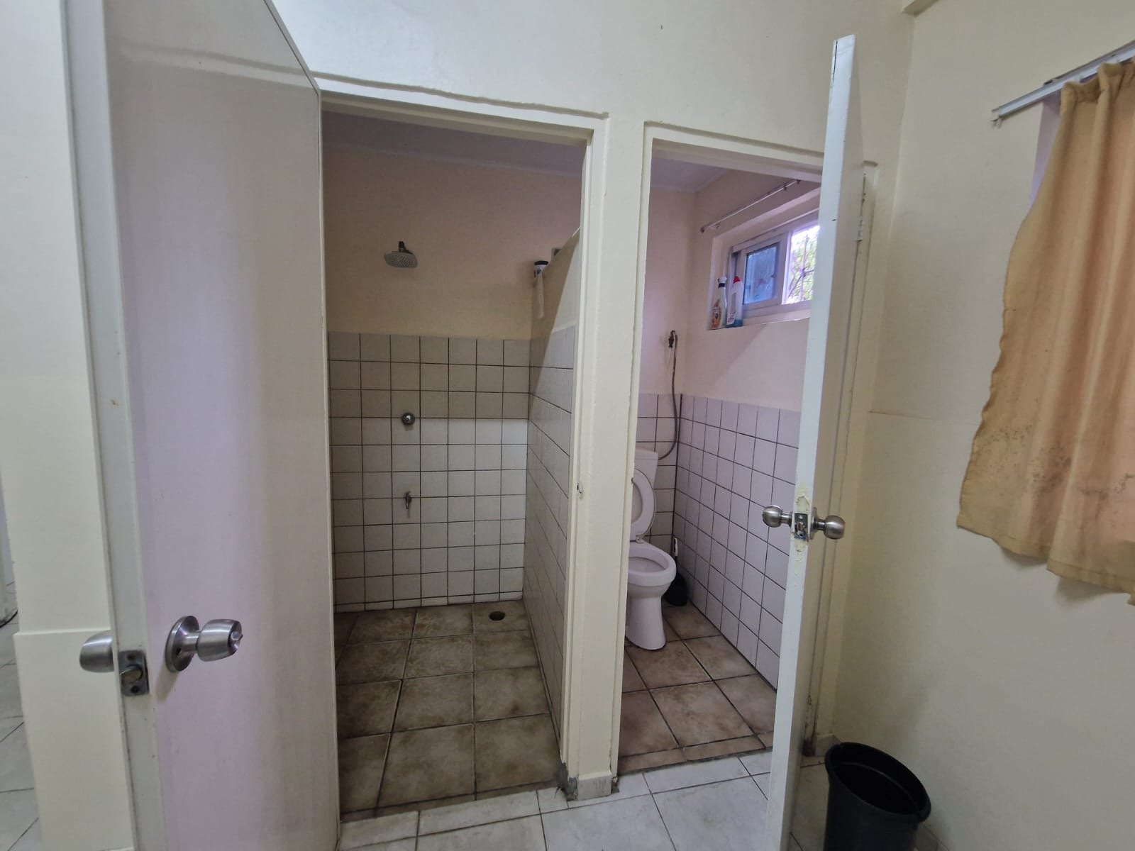 Private bathroom with shower and toilet